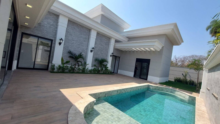 Imagem Casa com 4 Quartos à Venda, 693 m² em Condomínio Florais Itália - Cuiabá