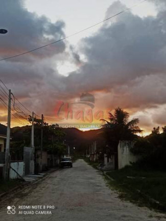 Imagem Casa com 4 Quartos à Venda, 250 m² em Pegorelli - Caraguatatuba Imagem Casa com 4 Quartos à Venda, 250 m² em Pegorelli - Caraguatatuba