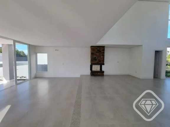 Imagem Casa de Condomínio com 4 Quartos à Venda,  em Vila Nova - Porto Alegre