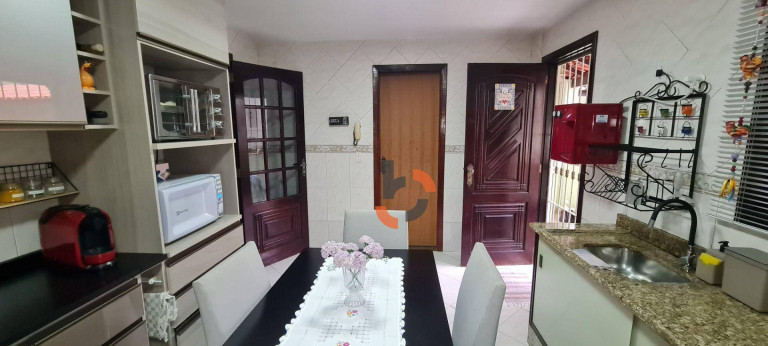 Imagem Casa com 4 Quartos à Venda, 212 m² em Caonze - Nova Iguaçu