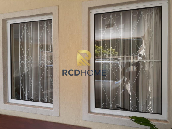 Imagem Casa com 4 Quartos à Venda, 199 m² em Uberaba - Curitiba