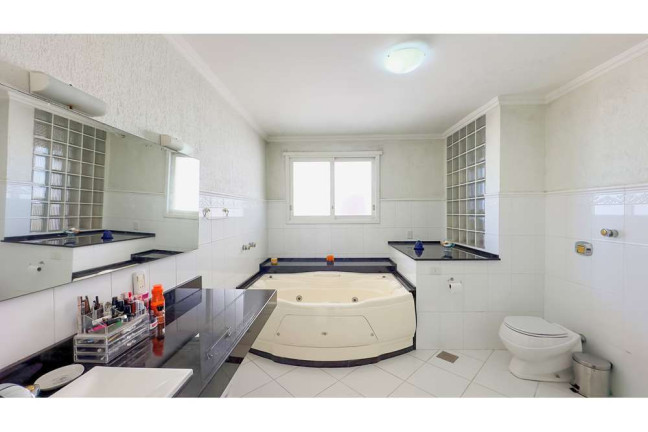 Imagem Casa com 4 Quartos à Venda, 394 m² em Vila Assunção - Porto Alegre