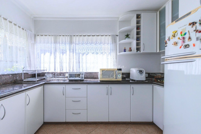 Imagem Casa com 5 Quartos à Venda, 374 m² em São João - Curitiba