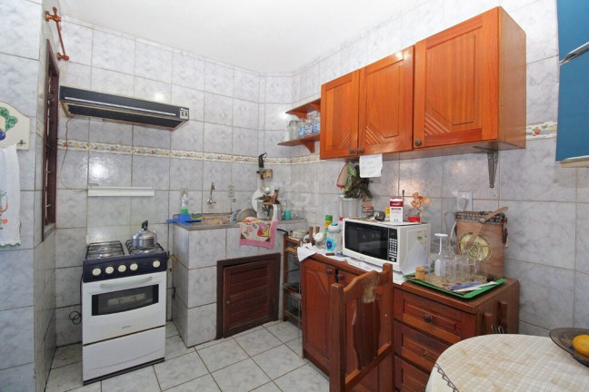 Imagem Casa com 4 Quartos à Venda, 300 m² em Glória - Porto Alegre