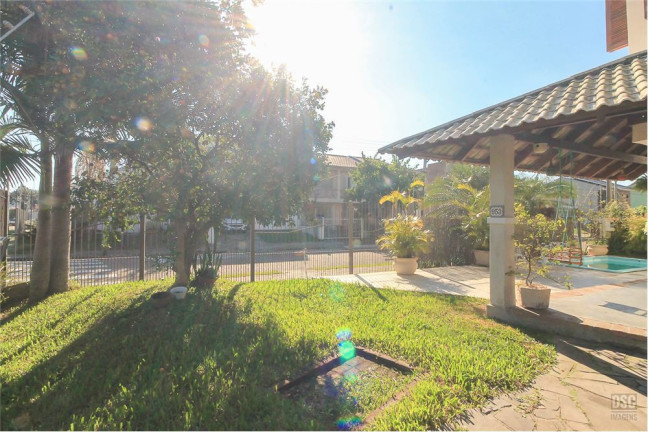 Imagem Casa com 4 Quartos à Venda, em Hípica - Porto Alegre Imagem Casa com 4 Quartos à Venda, em Hípica - Porto Alegre