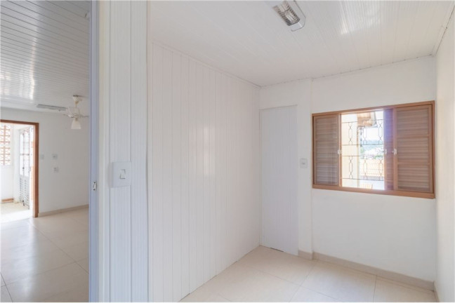 Imagem Casa com 5 Quartos à Venda,  em Partenon - Porto Alegre